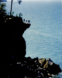 Hikers on Ledge, Pictured Rocks